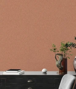 Papier peint vinyl sur support intissé uni chiné ocre